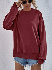 Brick Red sweatshirt with V-neck detail and ribbed cuffs and hem.