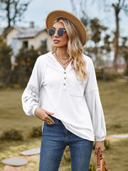 White ribbed henley hoodie with balloon sleeves and buttoned placket.