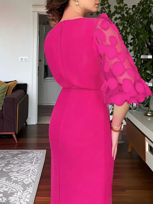 Rose red midi dress with sheer polka dot appliqué sleeves and a fitted silhouette.