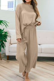 Khaki textured knit loungewear set with crew neck top and wide leg pants.