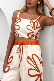 Floral print linen co-ord set with square neck crop top and drawstring waist pants in ochre.