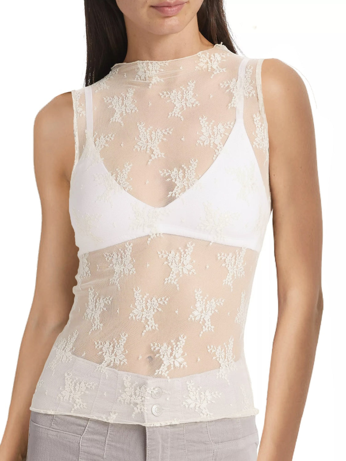 Sheer mock neck lace tank top in cream with floral pattern.