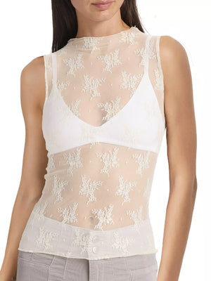 Sheer mock neck lace tank top in cream with floral pattern.