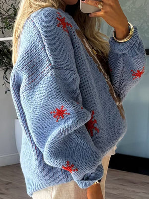 Light blue acrylic knit jumper with red boot intarsia pattern and brown accents.