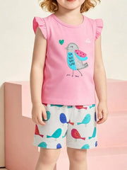 Pink cotton toddler outfit with bird graphic tee and bird print shorts.