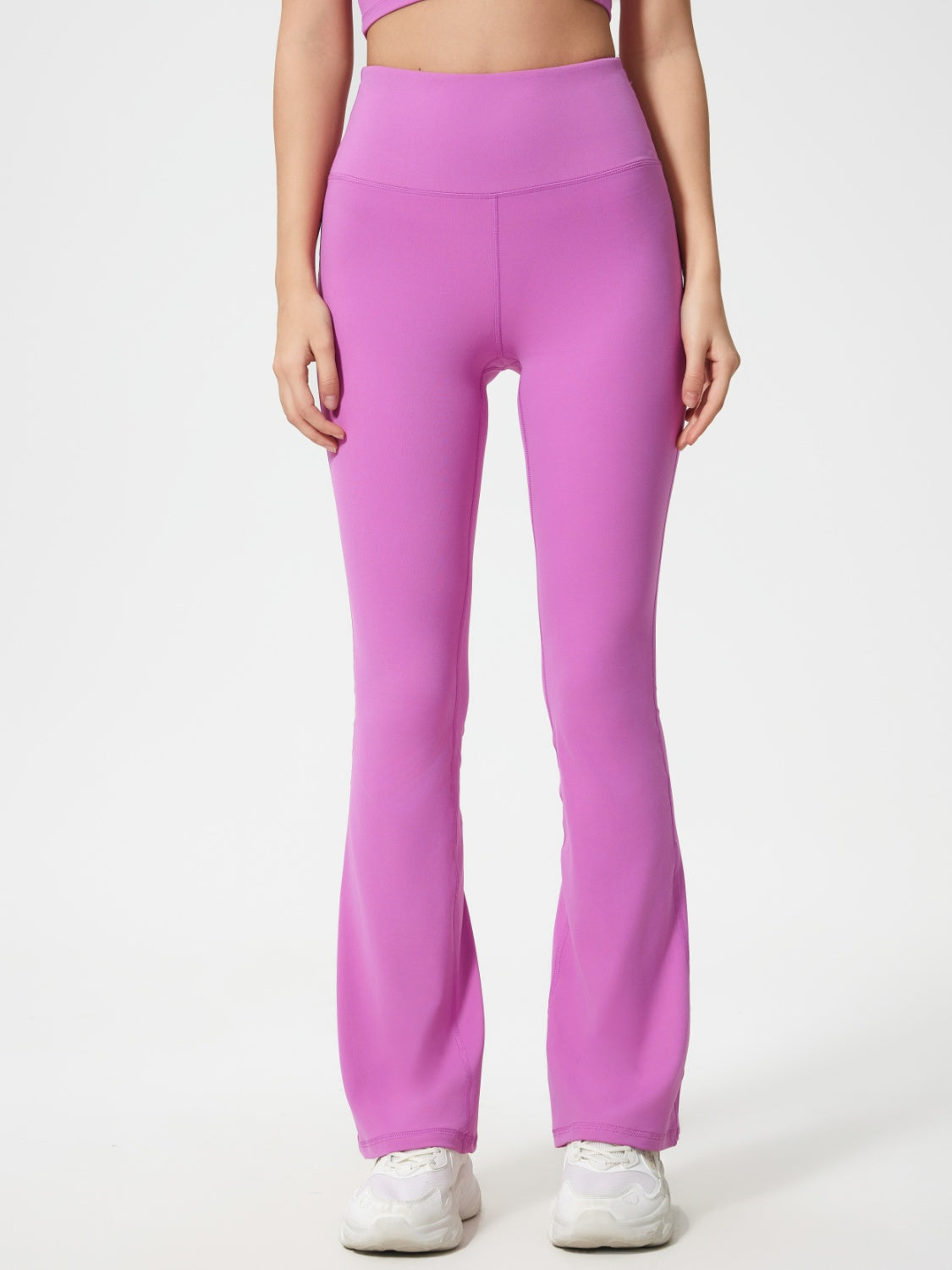 Flared sculpt leggings in Heliotrope Purple with a high-rise waist and subtle flare.