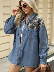 Denim trucker jacket in dusty blue with leopard print yoke and button front.