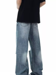 Men's blue distressed wide-leg jeans with ripped details.