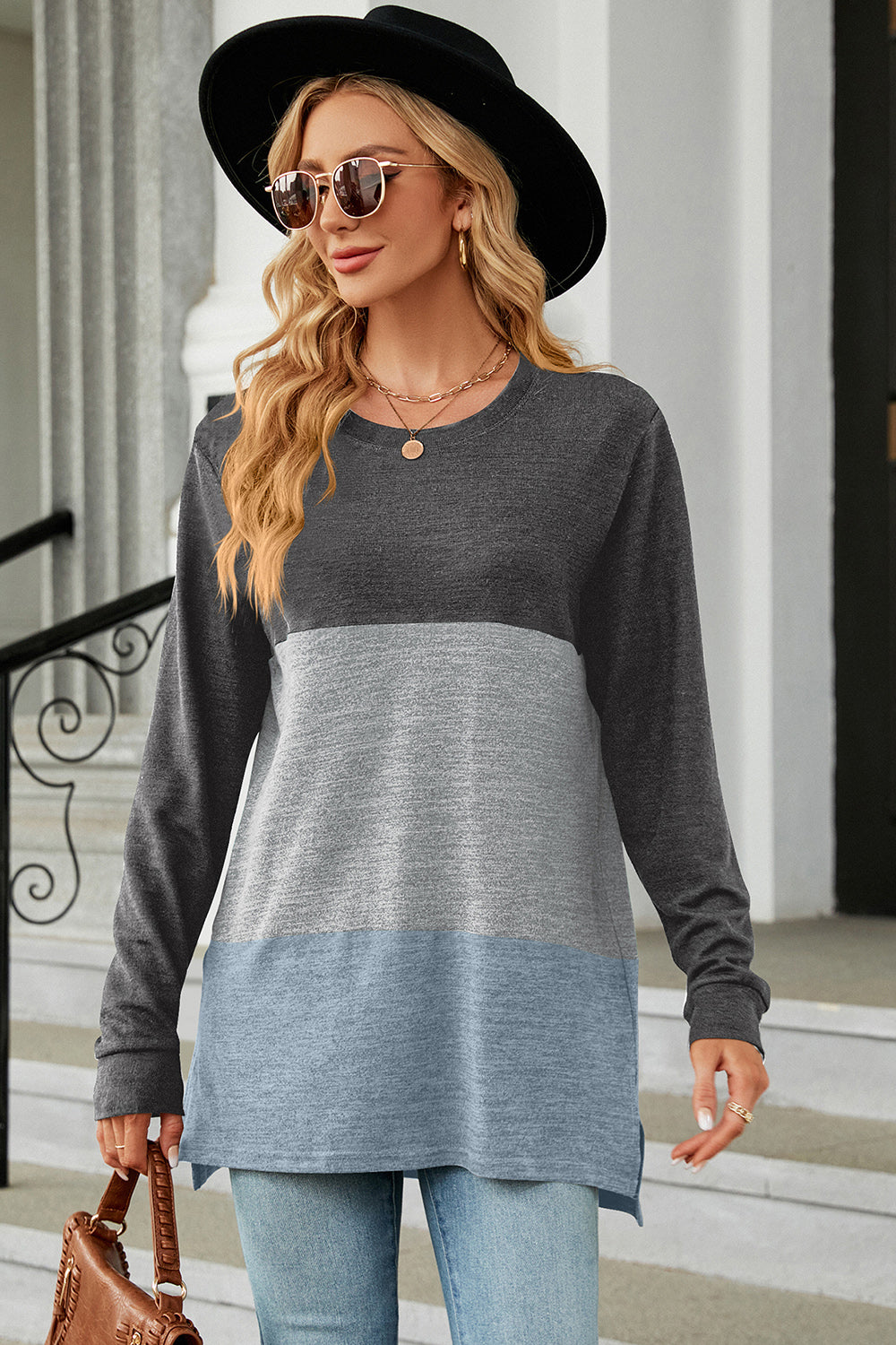 Colorblock long sleeve tee with crew neck and side slits in charcoal, light gray, and cloudy blue.