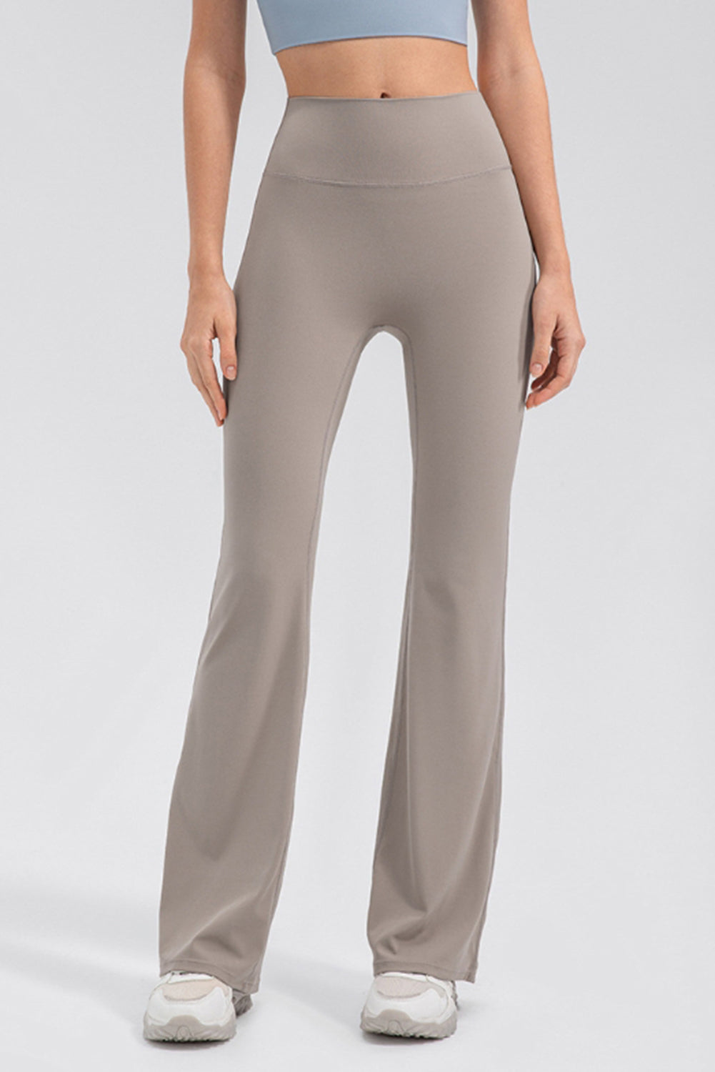 Sculpted flare leggings in tan with a high waist and performance fit.