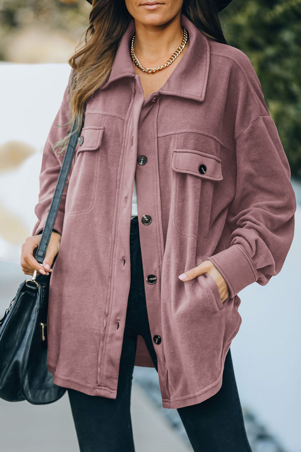 Fleece shirt jacket in Blush Pink with patch pockets and button front.