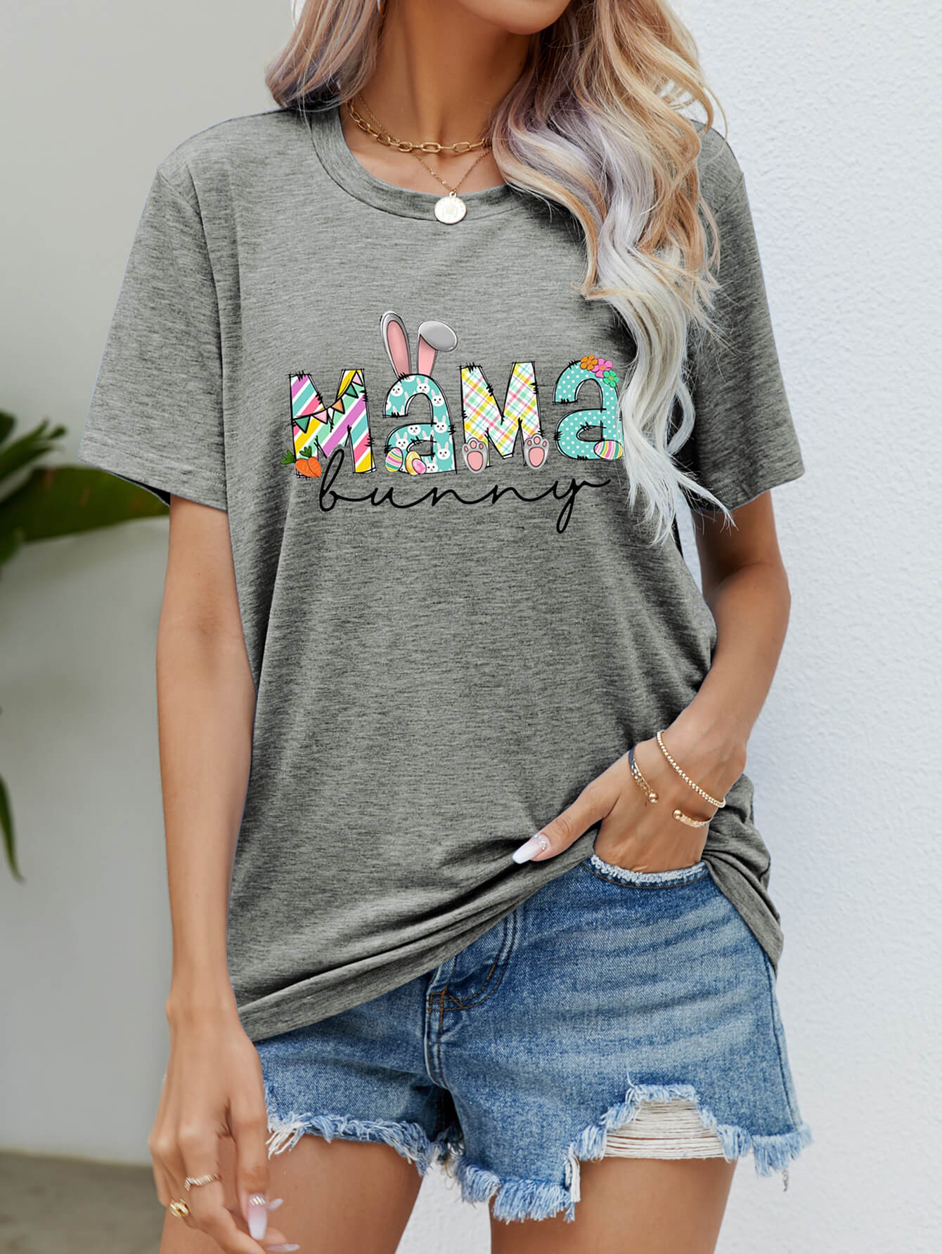 Heather gray t-shirt with "Mama Bunny" graphic featuring colorful patterns and bunny ears.
