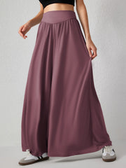 Drape-front wide-leg jersey trousers in Moonlit Mauve with a v-shaped waistband detail.