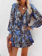 Blue leopard print tiered mini dress with ruffles and tie neck