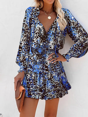 Blue leopard print tiered mini dress with ruffles and tie neck
