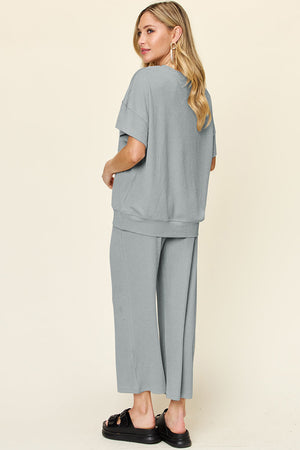 Waffle knit loungewear set in Cloudy Blue, featuring a short sleeve top and wide leg pants.