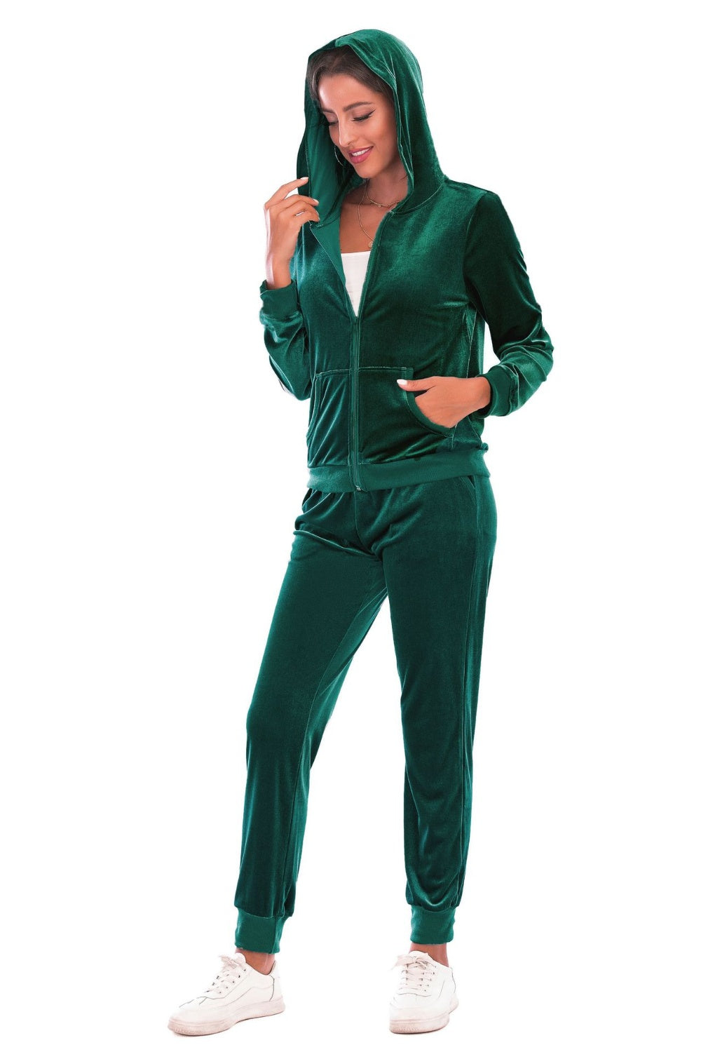 Green velvet loungewear set with zip-up hoodie and joggers.