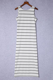 White and black striped maxi dress with a round neck and sleeveless cut.