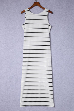White and black striped maxi dress with a round neck and sleeveless cut.