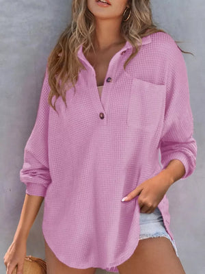 Waffle-knit henley tee in light purple with button placket and chest pocket.