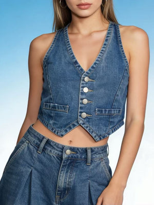 Cropped denim vest in dark blue with button-down front and pocket details.