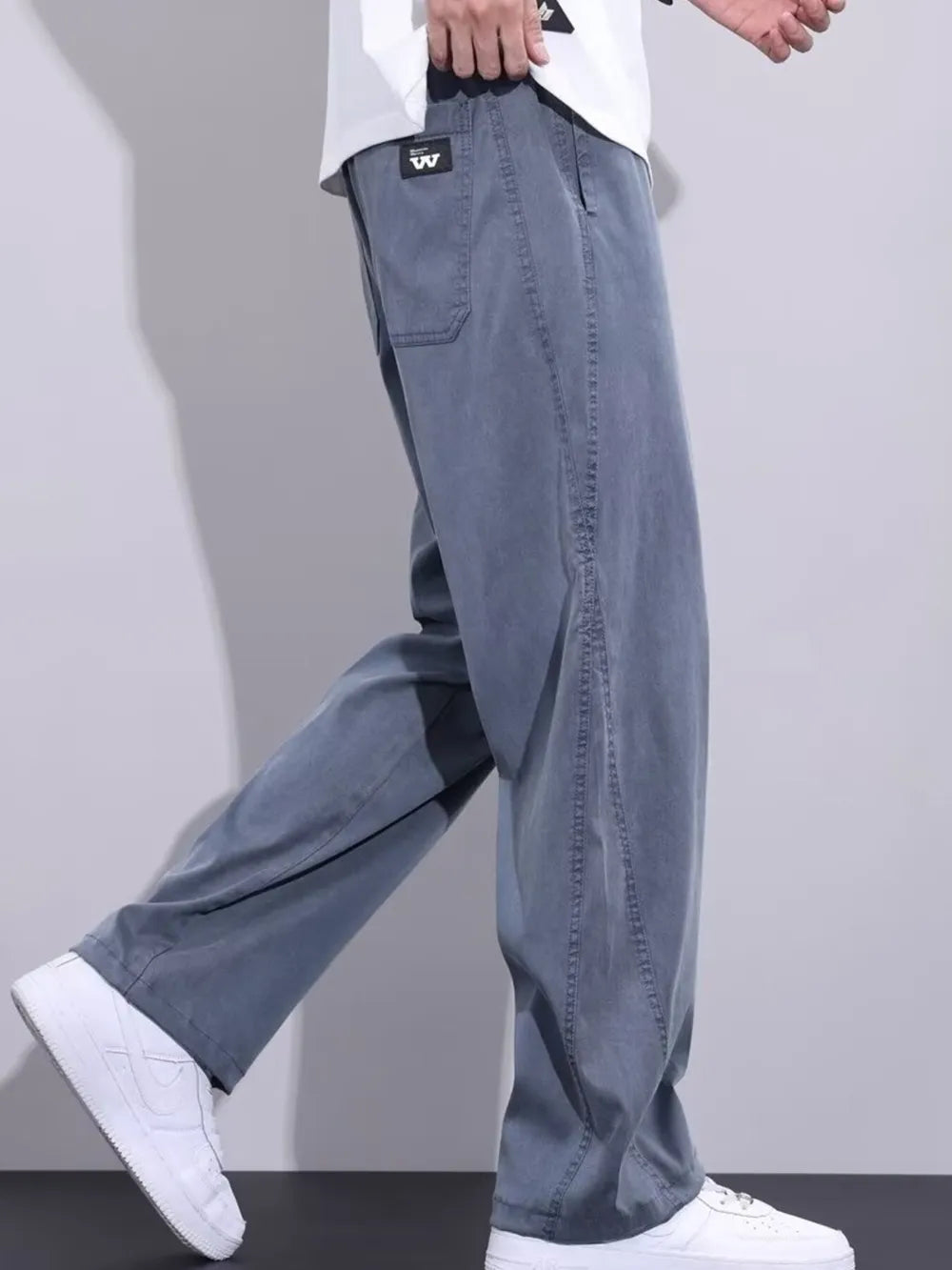 Men's blue relaxed fit sweatpants with drawstring and pocket detail