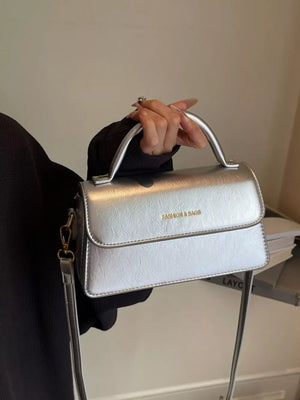 Top Handle Flap Mini Crossbody Bag in Silver, model styling view