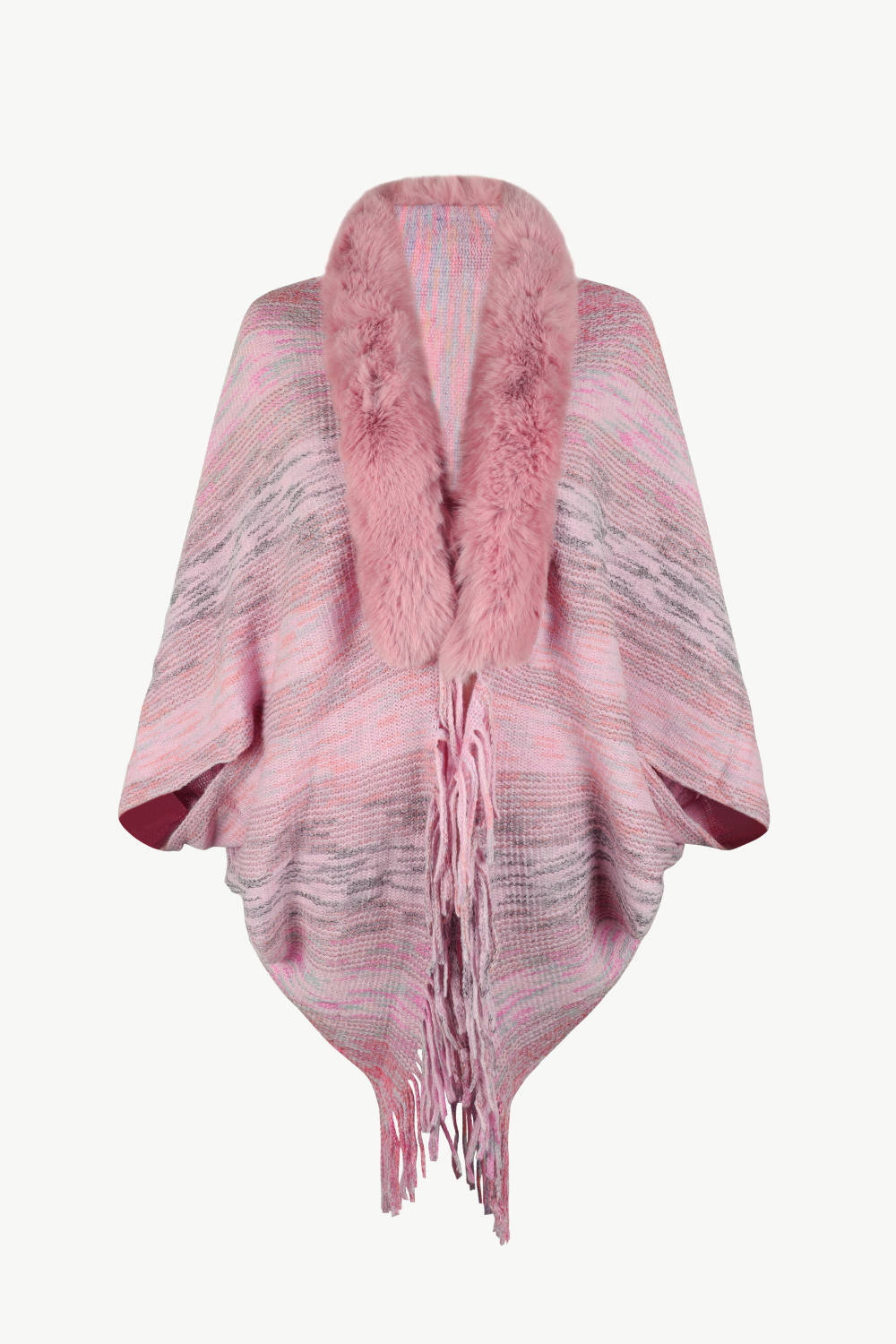 Textured knit cape in dusty pink with faux fur collar and fringe detail