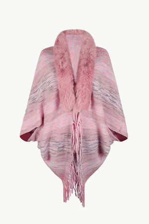 Textured knit cape in dusty pink with faux fur collar and fringe detail