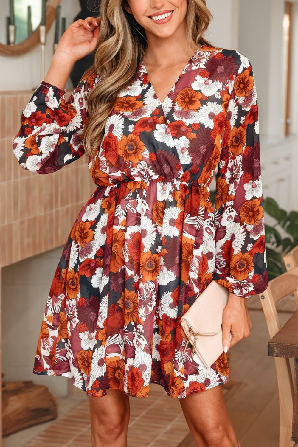 Floral wrap mini dress with puff sleeves in autumn floral print.