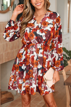 Floral wrap mini dress with puff sleeves in autumn floral print.