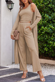 Tan ribbed knit duster, tank top, and wide-leg pants set with drawstring detail.