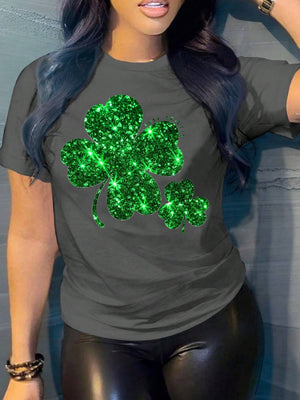 Dark gray t-shirt with a large glittery green shamrock graphic.