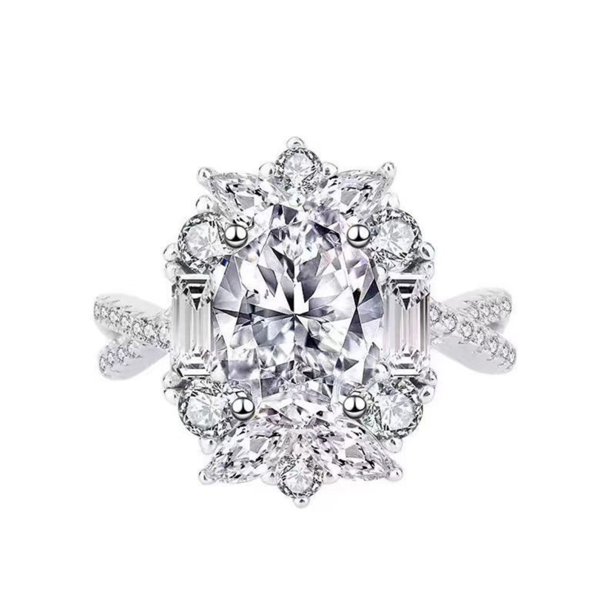 Sterling silver ring with oval moissanite center stone and halo of round and baguette stones.
