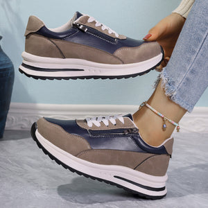 Zipper detail lace up sneakers in navy and tan with a chunky sole.