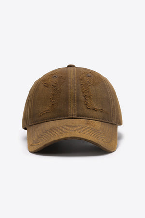 Distressed chestnut baseball cap with adjustable strap and curved brim.