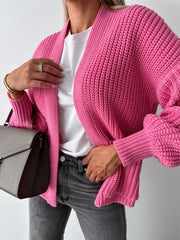 Hot Pink textured puff sleeve cardigan with ribbed cuffs and open front.