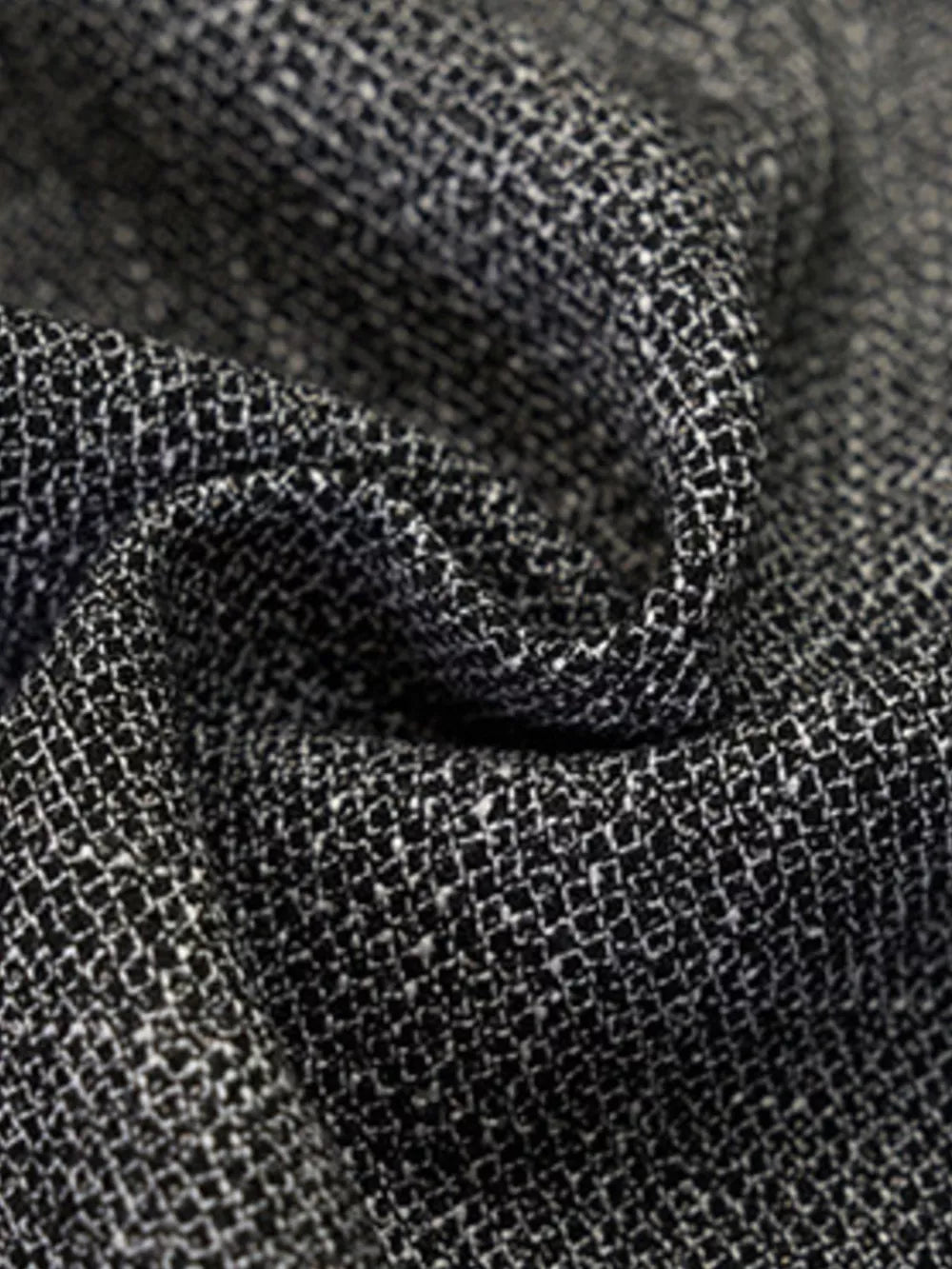 Dark gray textured sweatpants with a subtle woven pattern.