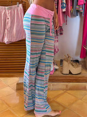 Relaxed striped joggers with pink waistband and drawstring, wide leg.