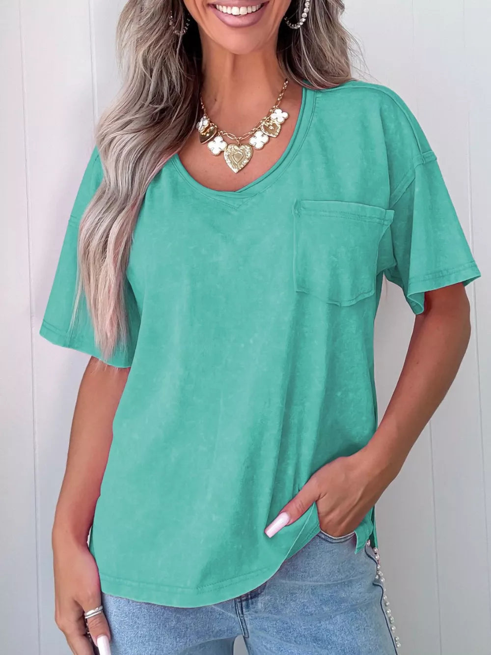 Mineral wash teal cotton v-neck tee with chest pocket and short sleeves
