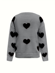 Gray oversized knit crewneck sweater with black heart pattern and drop sleeves.