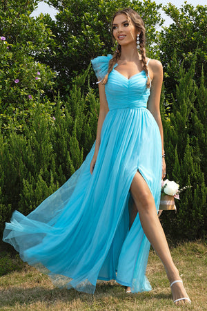 Aqua tulle gown with asymmetrical ruffle sleeve and high slit, sweetheart neckline.