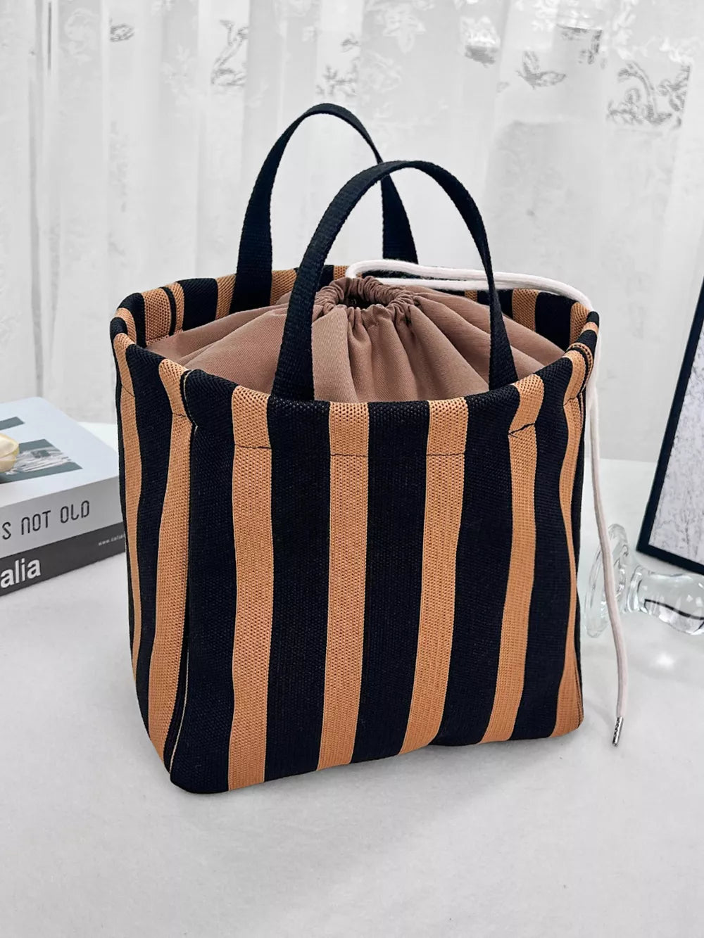 Striped Drawstring Medium Handbag, front view