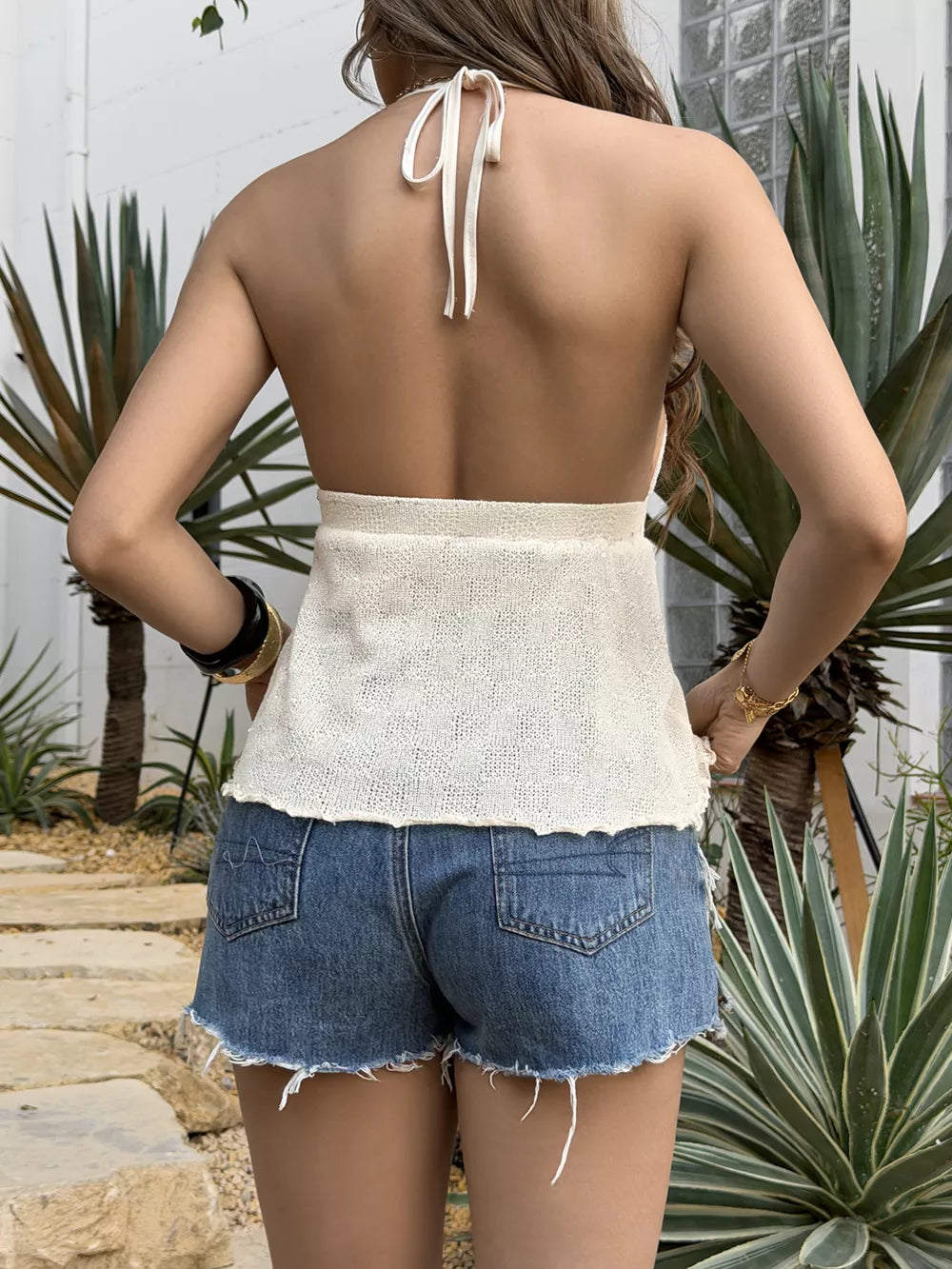 Iridescent shell-embellished halter cami with tie back, cropped knit style.