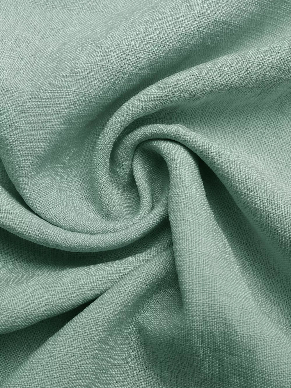 Maternity maxi dress fabric detail in sage green linen-look texture with ruffles.