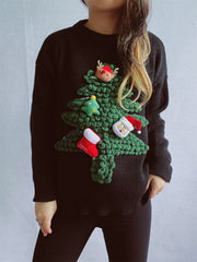 Black acrylic knit sweater with a 3D Christmas tree embellishment featuring Santa, elf, and stocking details.