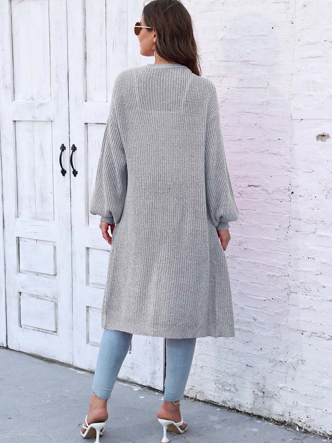 Ribbed knit maxi cardigan in light grey with balloon sleeves and pockets.