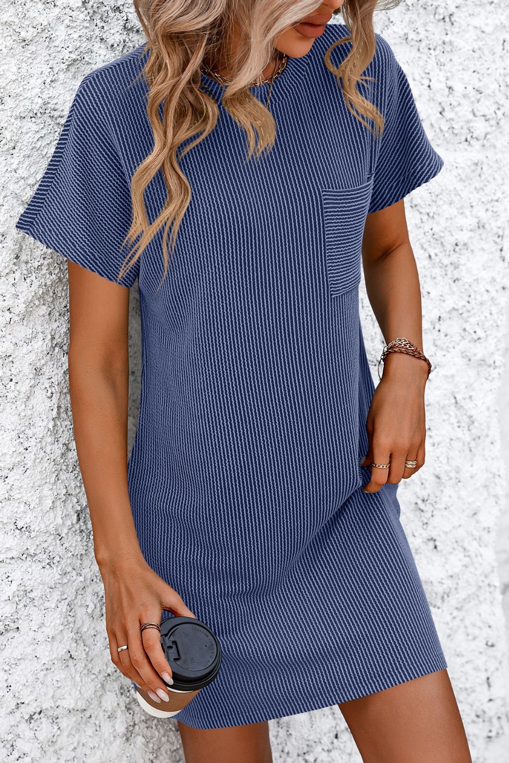 Blue ribbed tee dress with patch pocket and vertical stripes