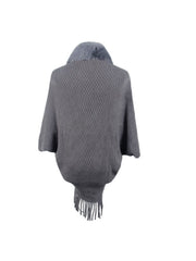Charcoal knit poncho with faux fur collar and fringe detail