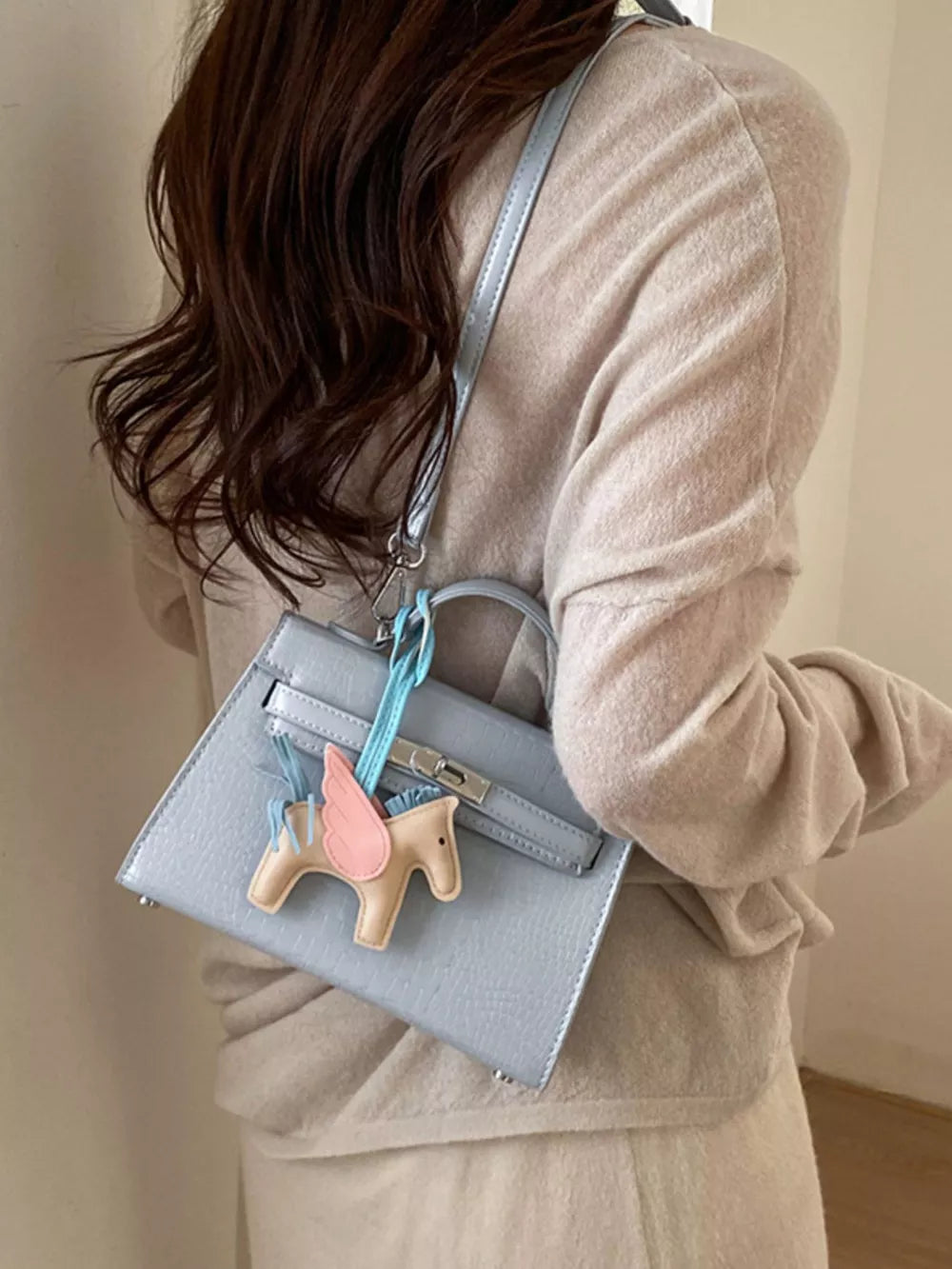 Crocodile Embossed Mini Crossbody Bag in Blue, side view